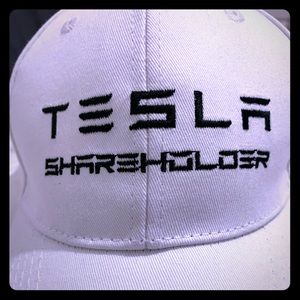 Tesla shareholder Hat brand new
